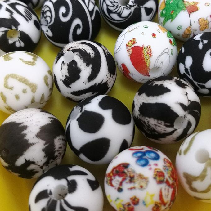 En gros 12mm bördelt kundenspezifisches Drucksilikon zähe Massenperlen Leopard-Druck-Silikon Teether für DIY-Baby-Dentitions-Spielzeug