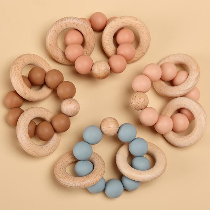 Kundenspezifisches umweltfreundliches freies Silikon Teether des Baby-Zahnenspielzeug-BPA mit hölzerner Ring Soft Toy 7.5*6*4cm Eco freundlicher KN DL13M03;GUA