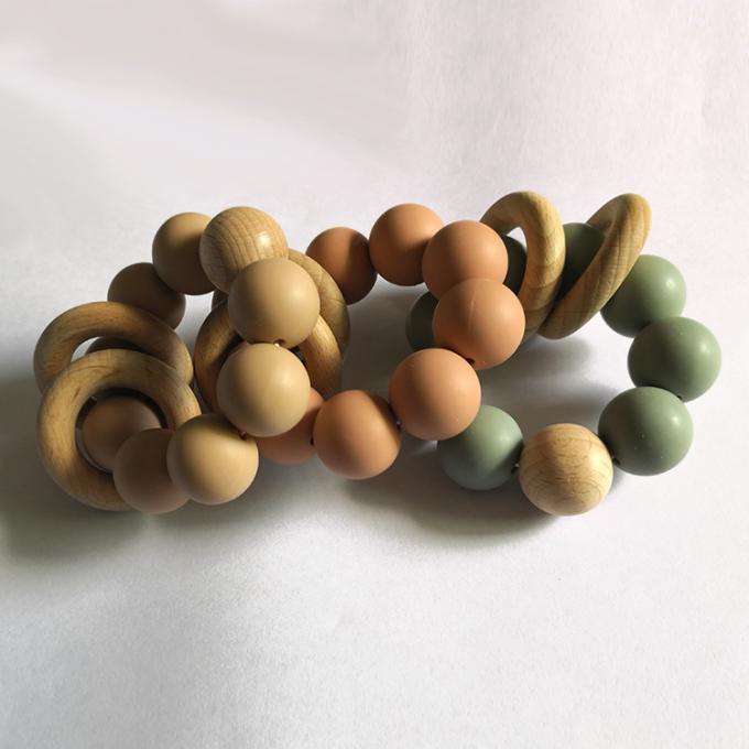 Kundenspezifisches Silikonperlenspielwarensilikonbaby teether mit hölzernem Armband 2