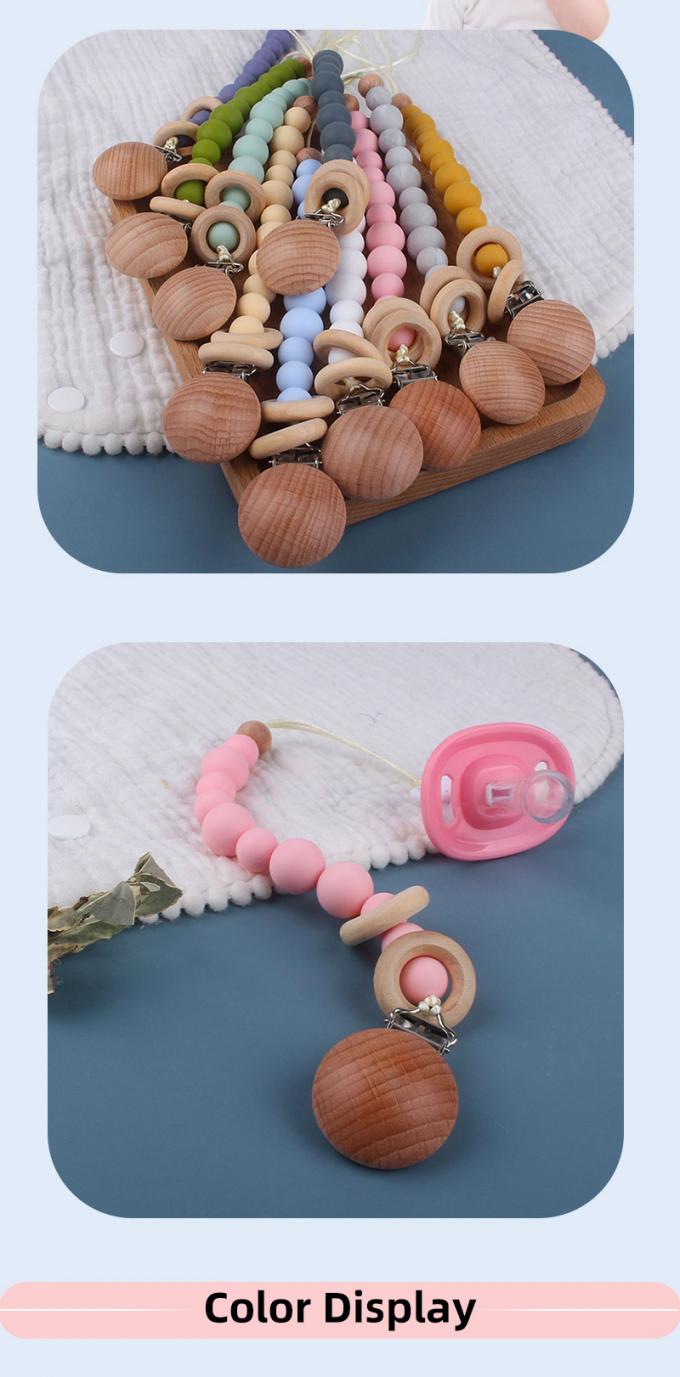 Umweltfreundliche Baby-Silikon-GroßhandelsHolzperle-blinde Baby-Friedensstifter-Ketten-Verhinderung mit Holzring